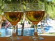 glasses of beer by the pool