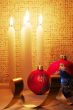 candles, balls and gold ribbons it are Christmas