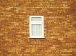 small window on a brick wall