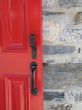 red door on a stone wall
