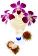 Rambutan with fruit juice and orchid