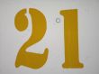 yellow number 21 sign