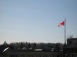 canadian flag in the blue sky
