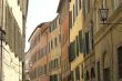 Old typical street in SIena (Tuscany)
