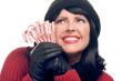 Attractive Woman Holds Candy Canes