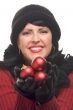 Attractive Woman Holding Red Ornaments