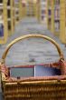 Basket of books in library