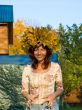 Woman with color autumn chaplet