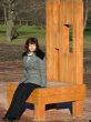 Woman sitting on the chair in the park