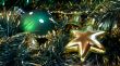 Green cristmas ball and golden star