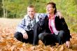 Mother and son in the autumn