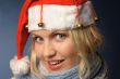 blonde girl in and santa hat