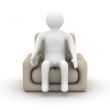 person sitting in an armchair. Isolated 3D image