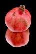 pomegranate on black macro