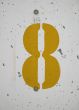 yellow number on a wall