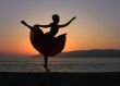 Dancing woman on the beach