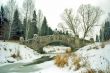 Ancient bridge over iced river