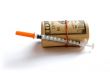 A roll of dollars with syringe