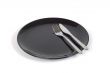 Black plate with knife and fork