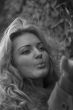 Pretty young girl sending kiss