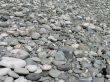 a gray pile of rounded rocks