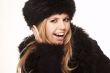Woman in black fur hat and coat