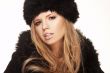 Woman in black fur hat and coat