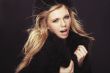Woman in black fur hat and coat