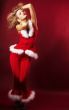 Beautiful sexy girl wearing santa claus clothes