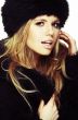 Woman in black fur hat and coat