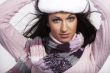 beautiful brunette with hat posing on white background