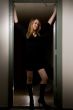Woman standing in doorway