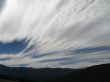 white moving clouds and blue