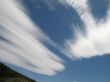 white moving clouds and blue