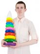 Young man and toy pyramid