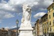 Pisa (Tuscany) - Statue of lion and colorful houses
