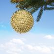 christmas bauble and blue sky