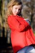 Child with a red jacket