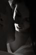 Young couple who are in love black and white with a ray of light