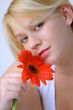 Young Woman with Red Flower
