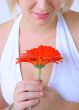 Young Woman with Red Flower