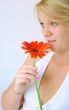 Young Woman with Red Flower
