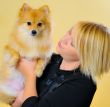 Model with a Pomeranian