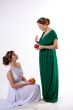 Two ladies and two apples