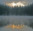 Sunrise on mountain lake