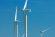 three windturbines on blue sky