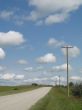 dirt road through the field