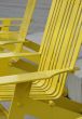 yellow chairs in a park