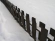 wooden fence with snow