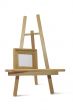 small wooden empty frame on easel